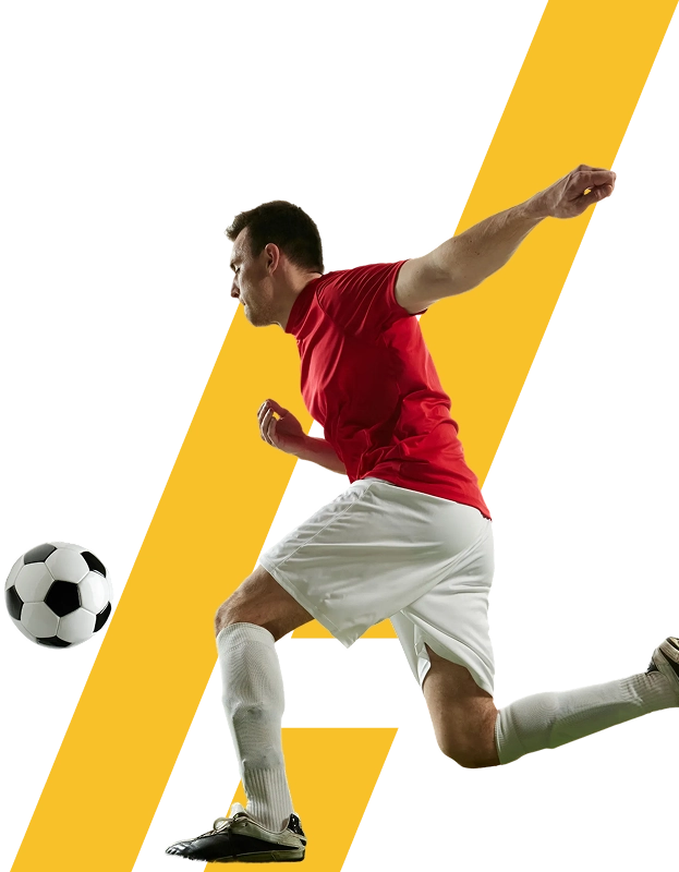 Um jogador de futebol em ação preparando-se para chutar a bola, representando torneios de futebol, desempenho da equipa, análise de jogos e competição desportiva.